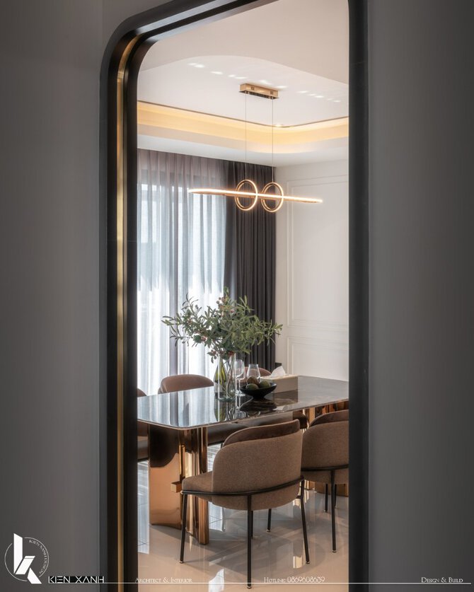Thiết kế liền mạch giữa phòng khách và khu vực ăn uống tạo nên không gian mở rộng rãi