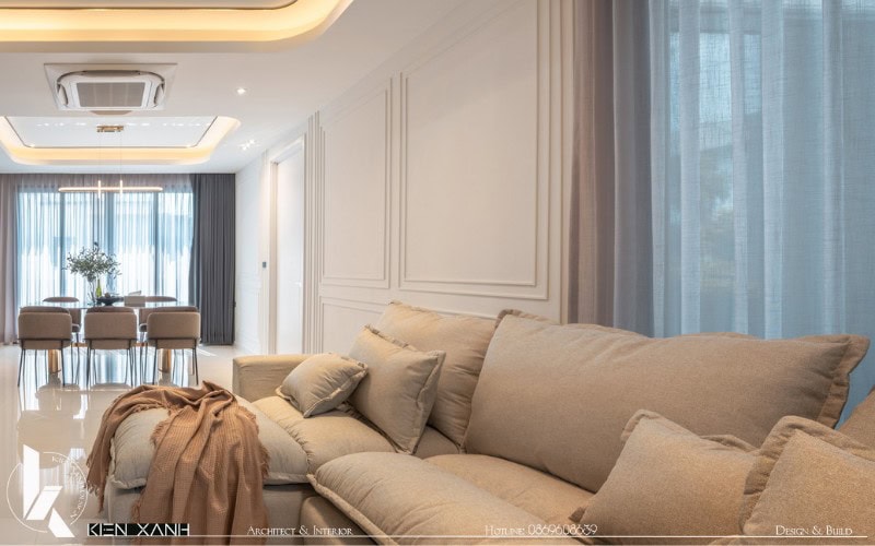 Bộ sofa đơn giản, tone màu hài hoà với sắc trắng chủ đạo của không gian